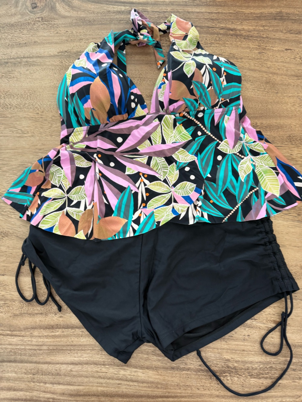 Black High-Rise Shorts with Side Ruching and Colorful Top